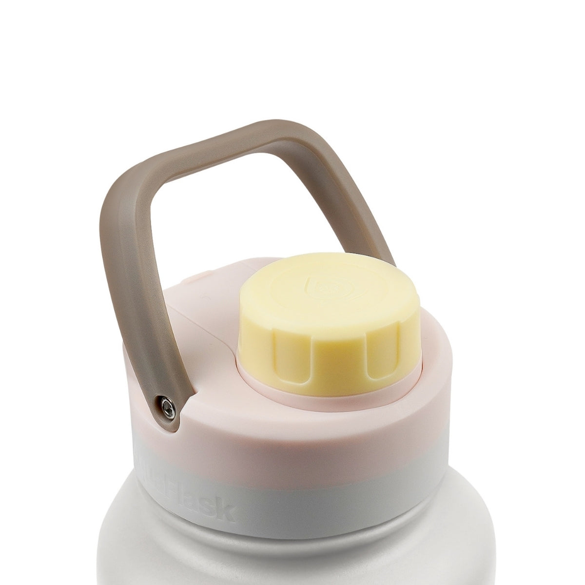 Botella de agua de acero inoxidable con aislamiento de la colección Colorwave de AquaFlask en color Spiced Vanilla con acabado degradado suave, tapa de rosca con asa de transporte y base de silicona, fotografiada sobre fondo blanco