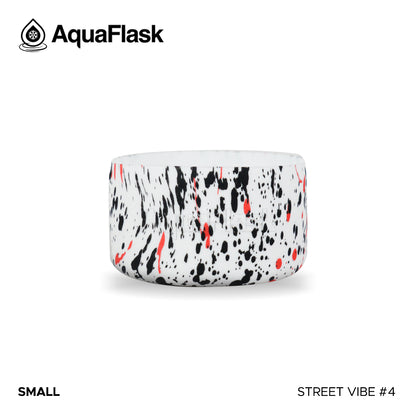 Accesorio de base de silicona Aquaflask con logotipo en relieve, diseñado para encajar en la base de las botellas Aquaflask Regular.