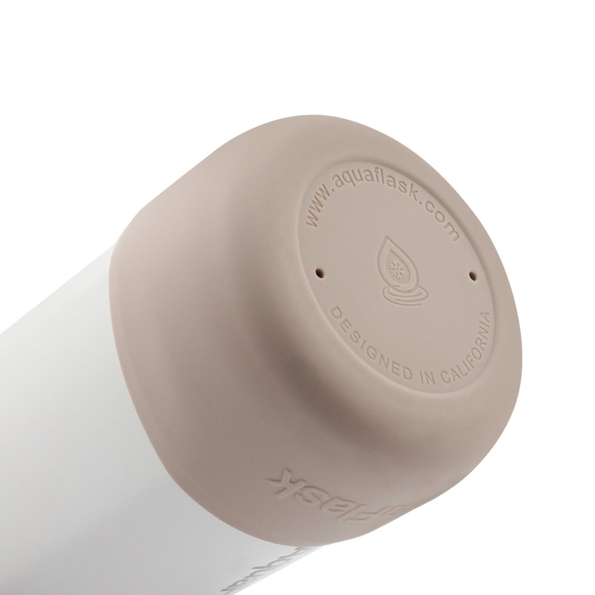 Botella de agua de acero inoxidable con aislamiento de la colección Colorwave de AquaFlask en color  Spiced Vanilla con acabado degradado suave, tapa de rosca con asa de transporte y base de silicona, fotografiada sobre fondo blanco