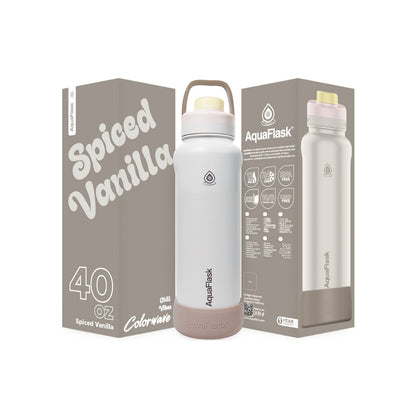 Botella de agua de acero inoxidable con aislamiento de la colección Colorwave de AquaFlask en color  Spiced Vanilla con acabado degradado suave, tapa de rosca con asa de transporte y base de silicona, fotografiada sobre fondo blanco