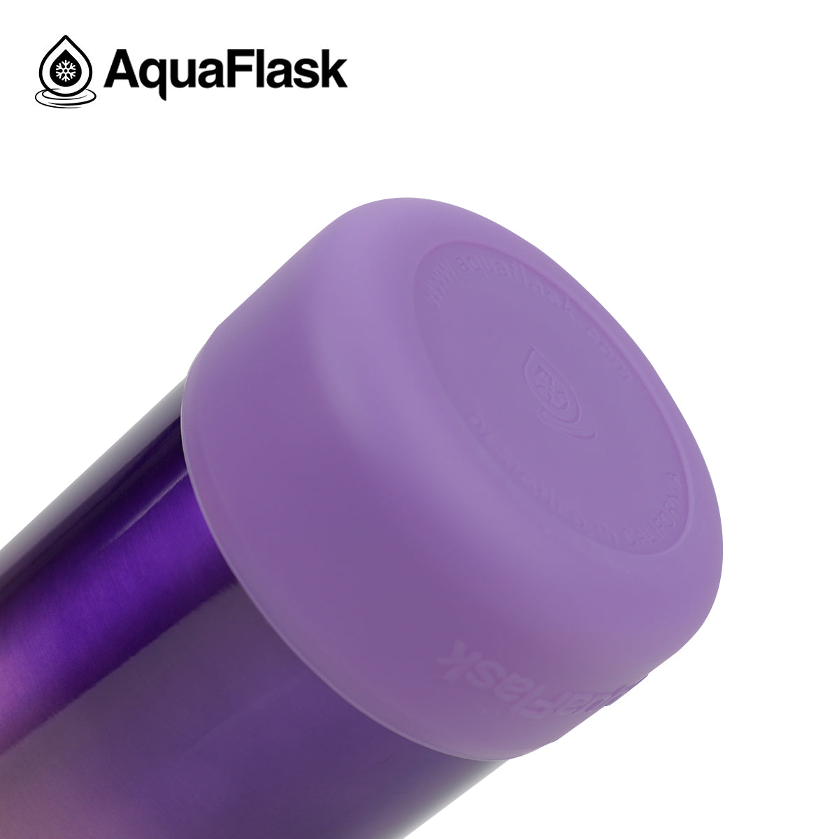 Botella de agua de acero inoxidable con aislamiento de la colección Terra de AquaFlask en color Wonderland Bliss, con acabado liso y brillante, tapa de rosca con asa de transporte y base de silicona, fotografiada sobre fondo blanco