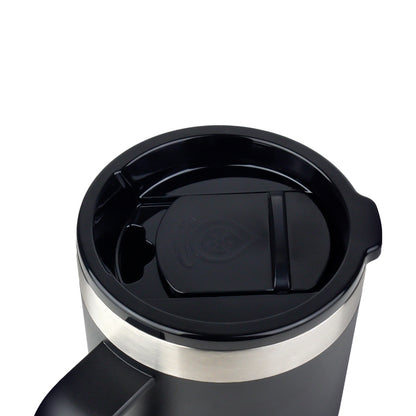 Taza térmica AquaFlask en color Jet Black con acabado negro mate suave, borde de acero inoxidable, asa ergonómica y tapa antiderrames, fotografiada sobre fondo blanco